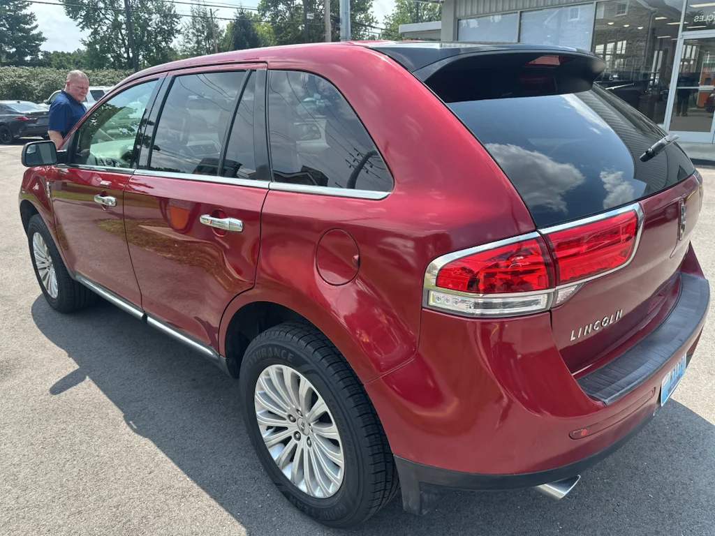 Used 2014 Ruby Red Metallic Tinted Clearcoat Lincoln Base image 5