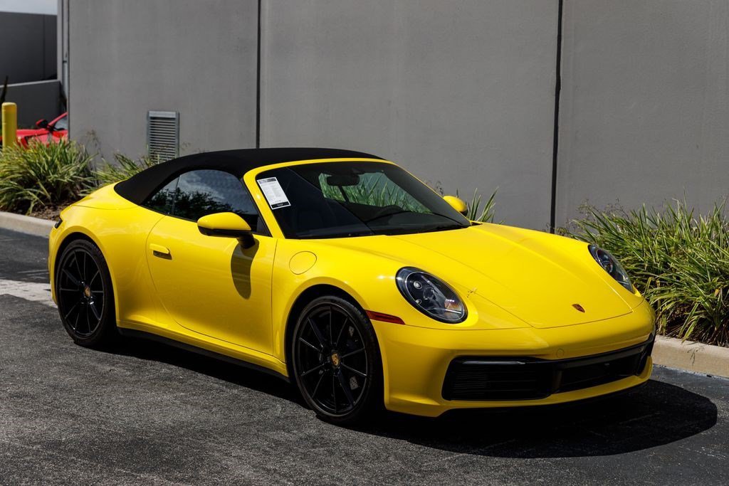 Used 2022 Racing Yellow Porsche Carrera image 7