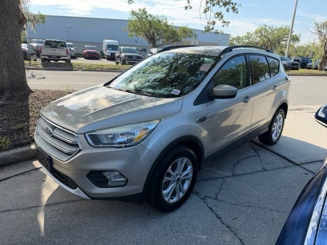 Used 2018 White Gold Metallic Ford SE image 1