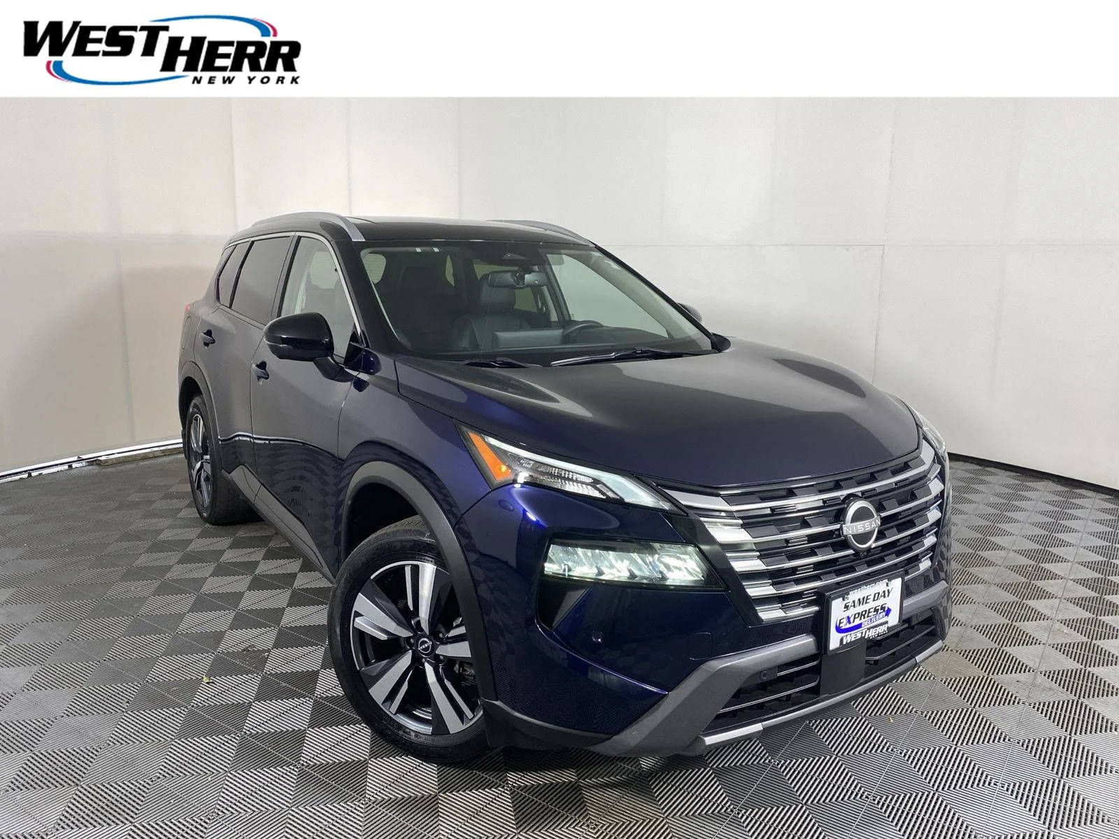 Used 2024 Deep Ocean Blue Pearl/Super Black Nissan SL image 1
