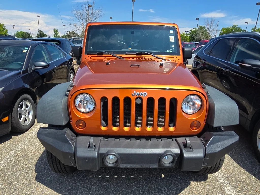 Used 2011 Mango Tango Pearlcoat Jeep Sport image 8