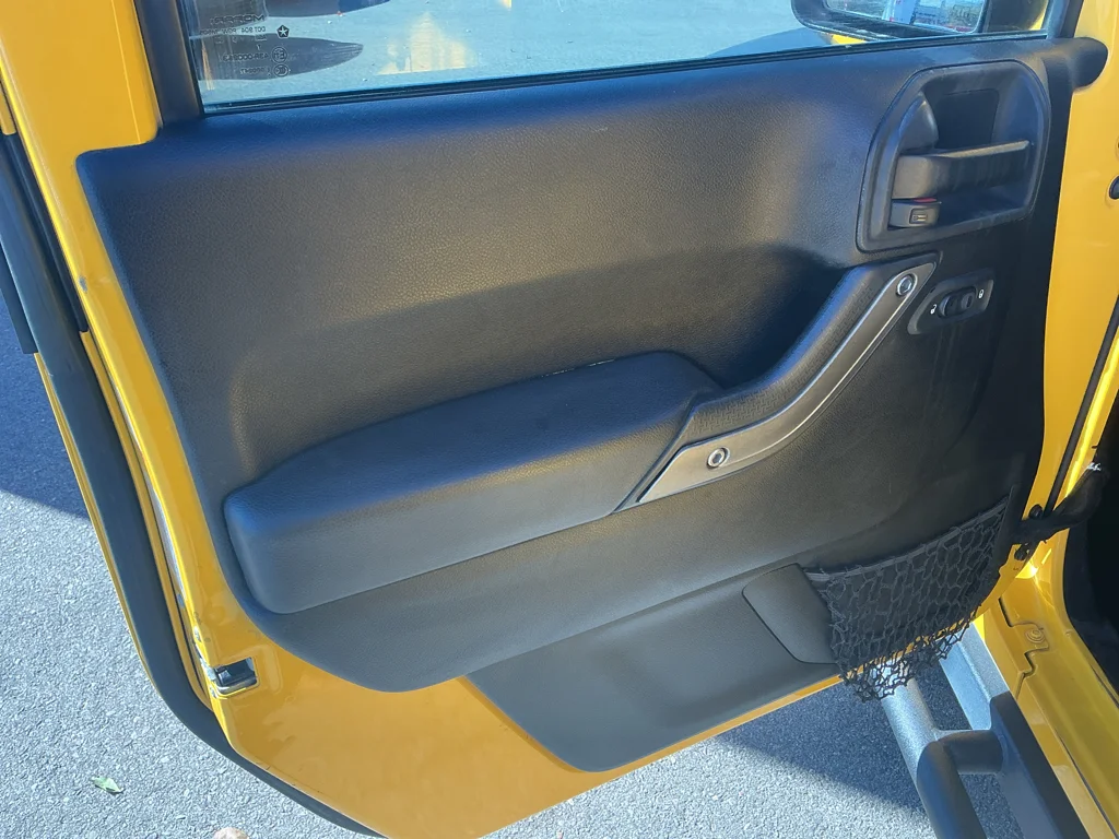 Used 2015 Baja Yellow Jeep Sport image 11