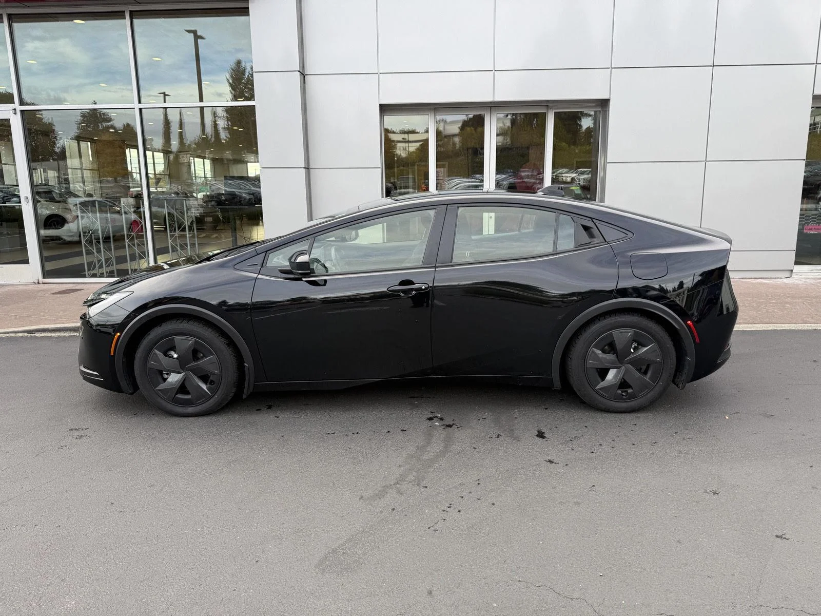 Used 2025 Midnight Black Metallic Toyota SE image 2
