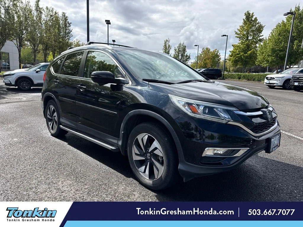 Used 2016 Crystal Black Pearl Honda Touring image 1