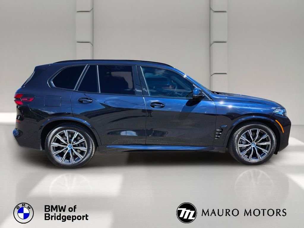 Used 2025 Black BMW xDrive50e image 7