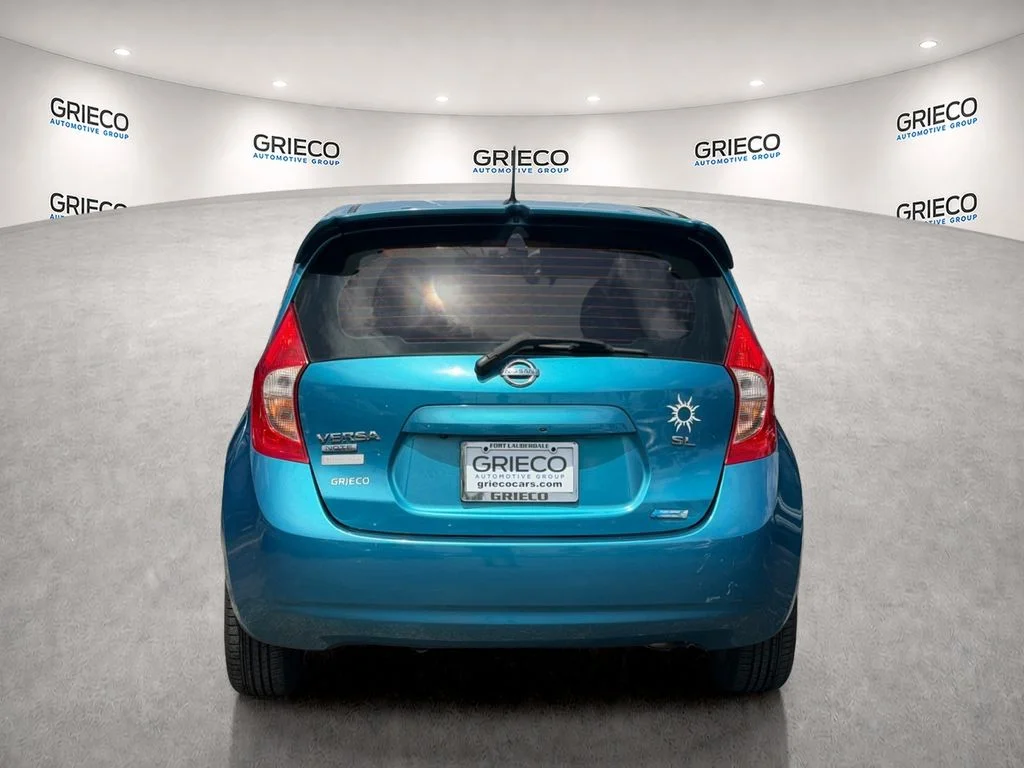 Used 2014 Metallic Peacock Nissan SV image 6