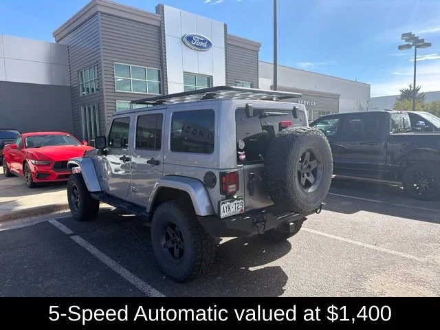 Used 2018 Silver Jeep Unlimited Altitude image 4