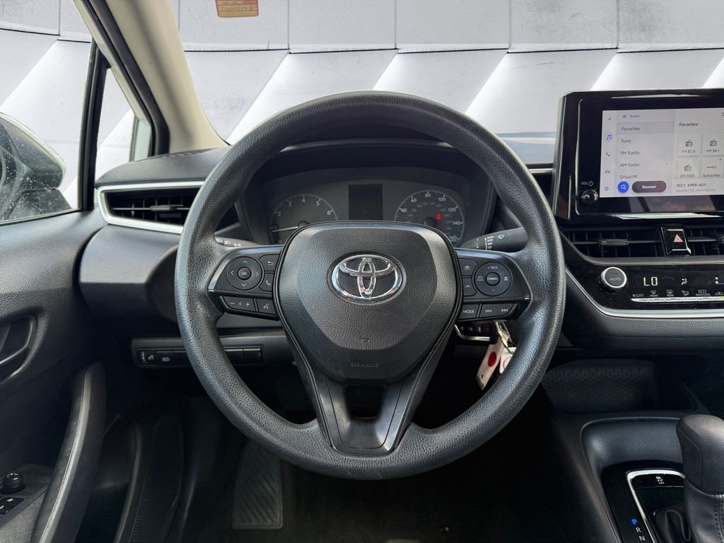 Used 2024 White Toyota LE image 9