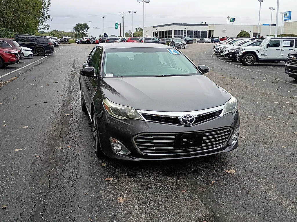 Used 2014 Magnetic Gray Metallic Toyota XLE image 1