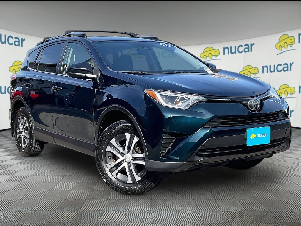 Used 2017 Blue Toyota LE image 1