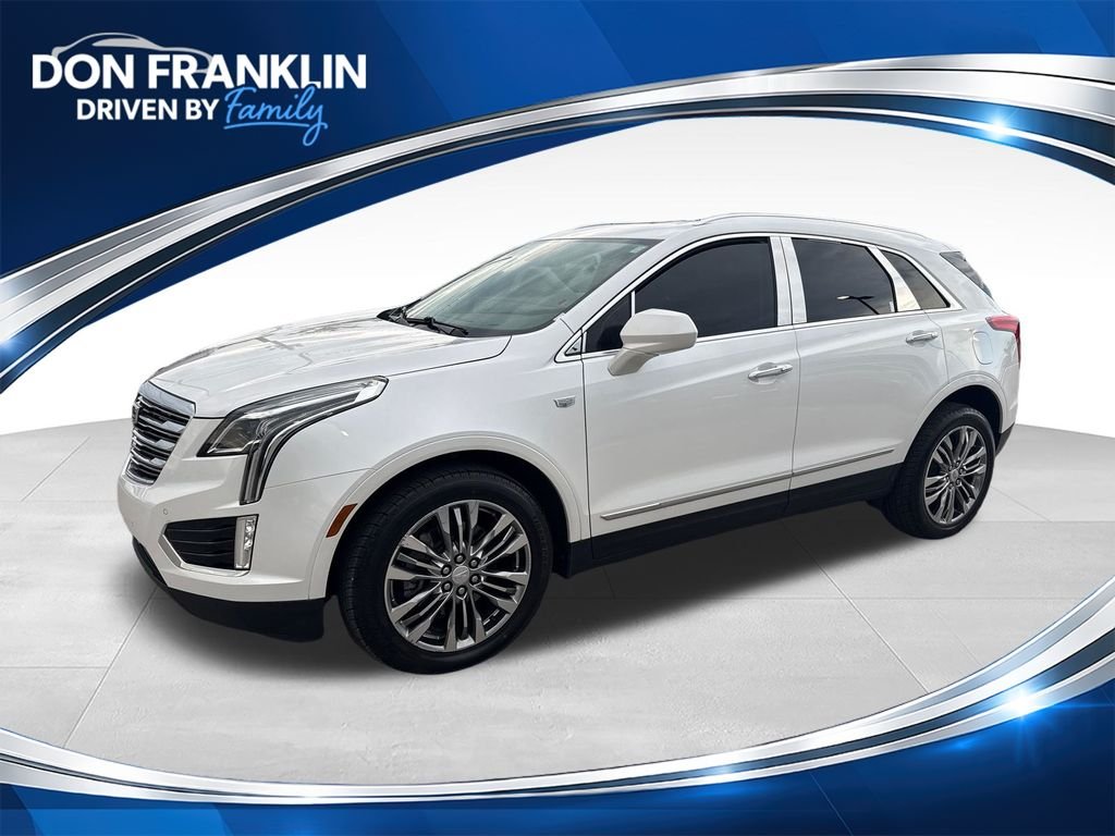 Used 2018 White Cadillac Premium Luxury image 1