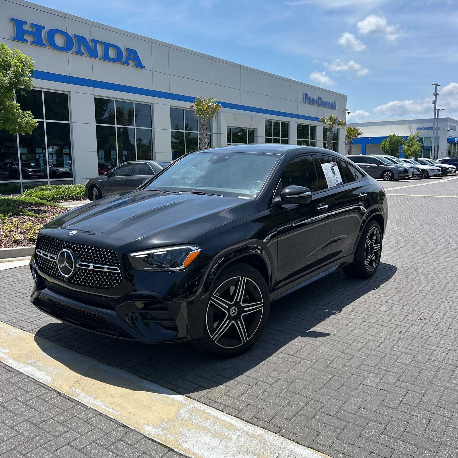 Certified Used 2025 Obsidian Black Metallic Mercedes-Benz GLE 450 image 2