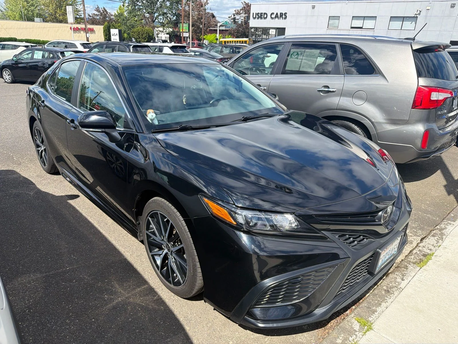 Used 2023 Midnight Black Metallic Toyota SE image 3