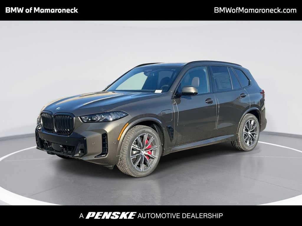 New 2026 Green Metallic BMW xDrive50e image 1