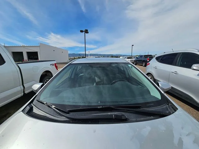 Used 2014 Classic Silver Metallic Toyota LE image 4