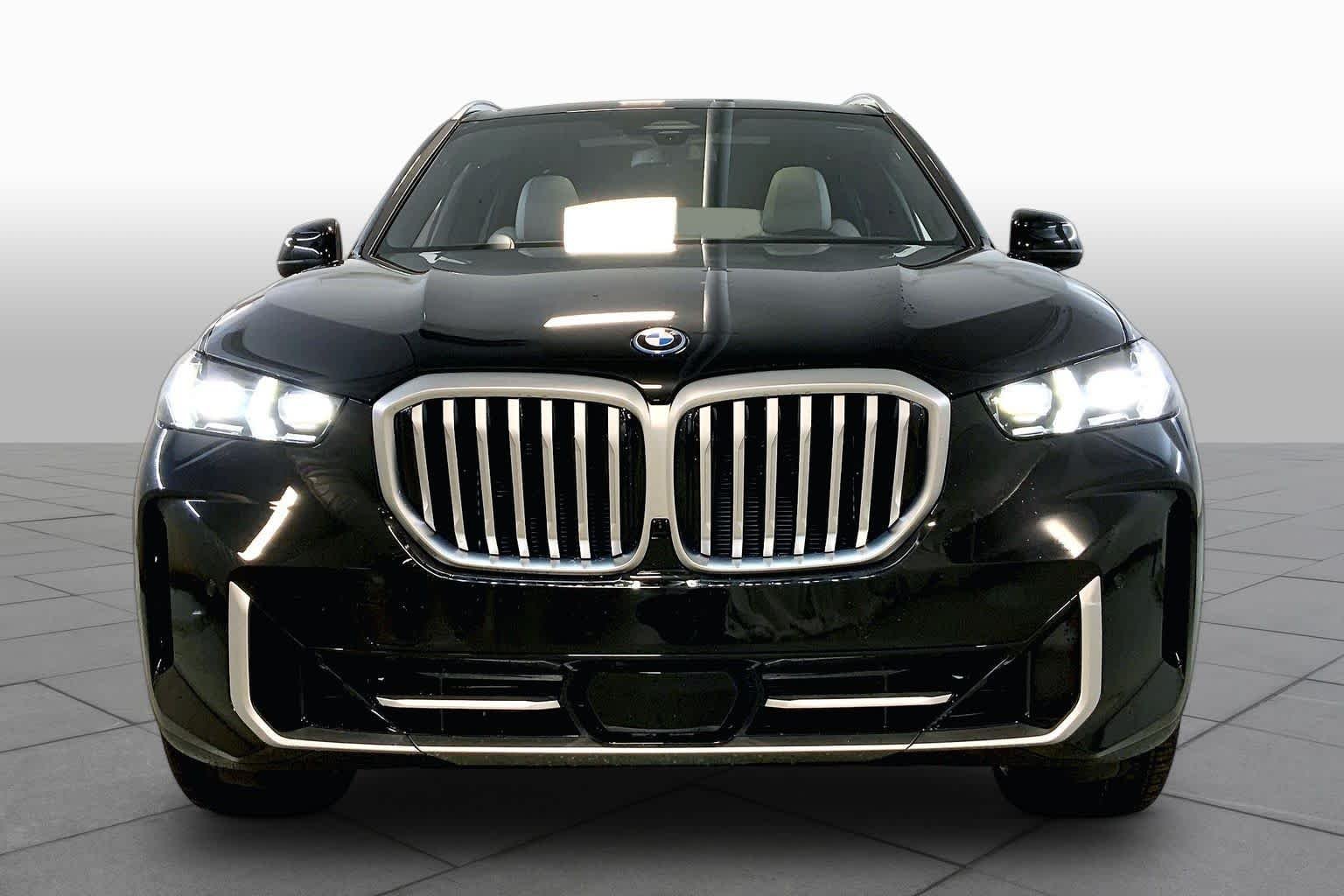 New 2026 Black Sapphire Metallic BMW xDrive50e image 3