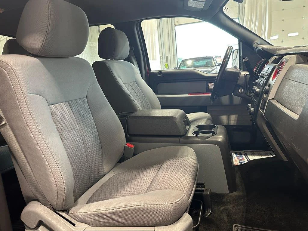 Used 2012 Race Red FORD 4WD SUPERCREW 145