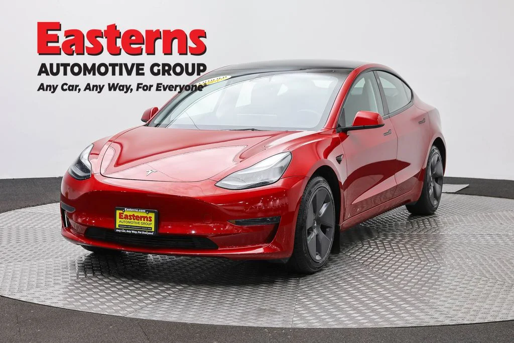 Used 2023 Red Tesla Base image 1