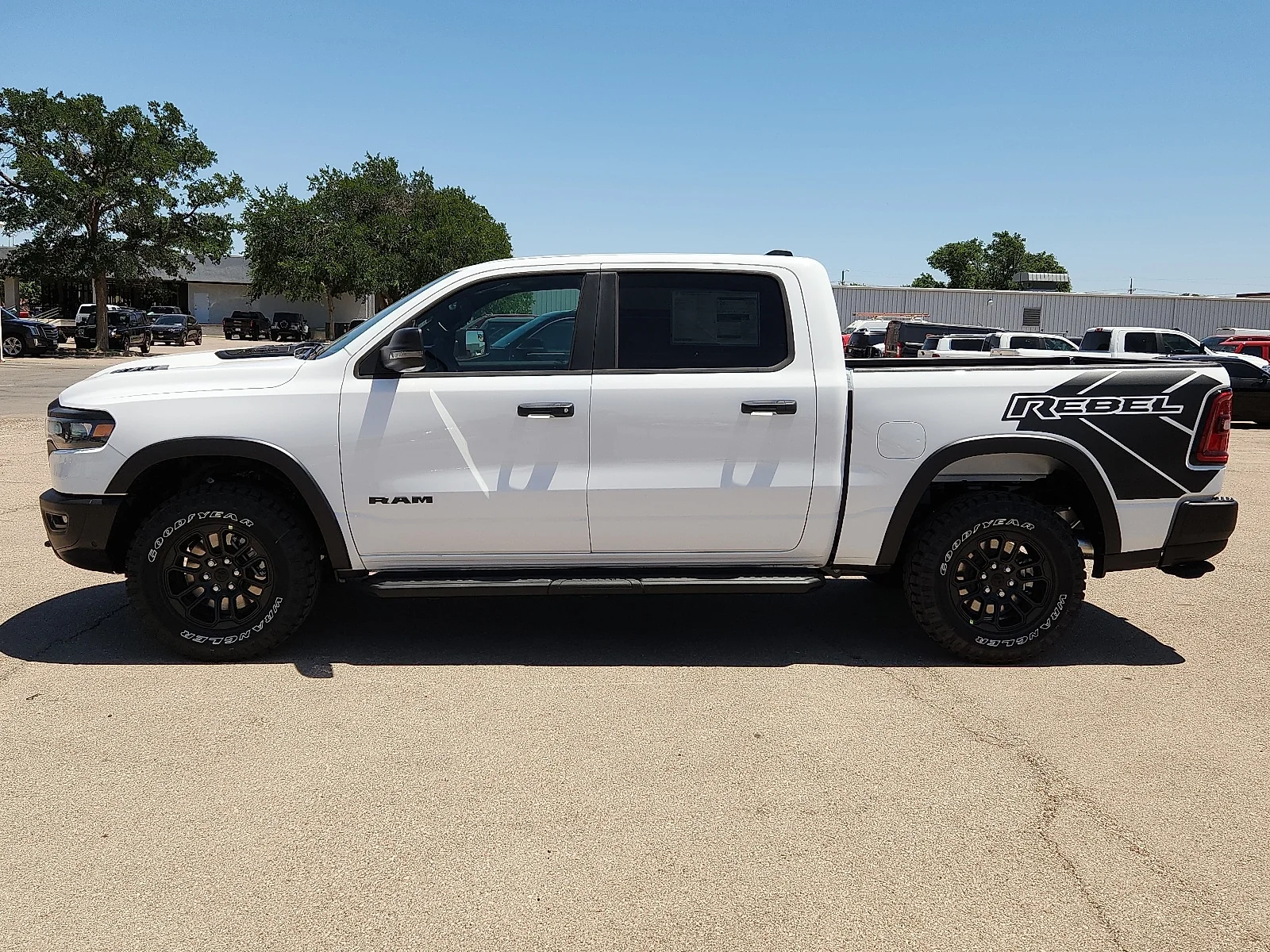 New 2026 Bright White Clear-Coat  Paint Ram REBEL CREW CAB 4X4 5