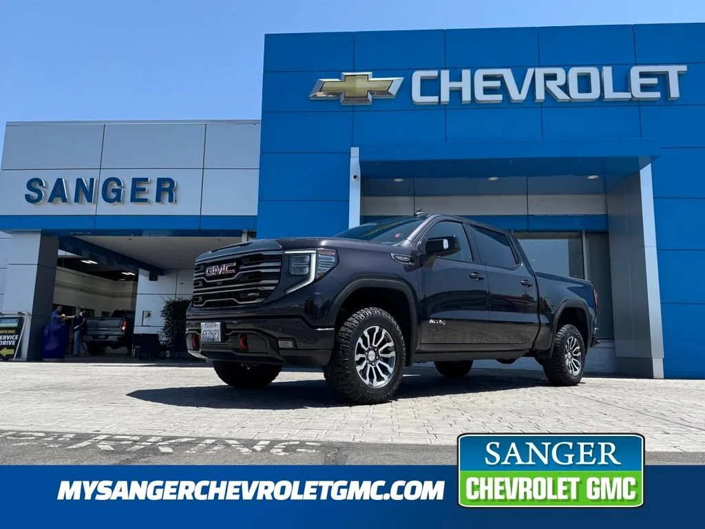 Used 2023 Titanium Rush Metallic GMC AT4 image 1