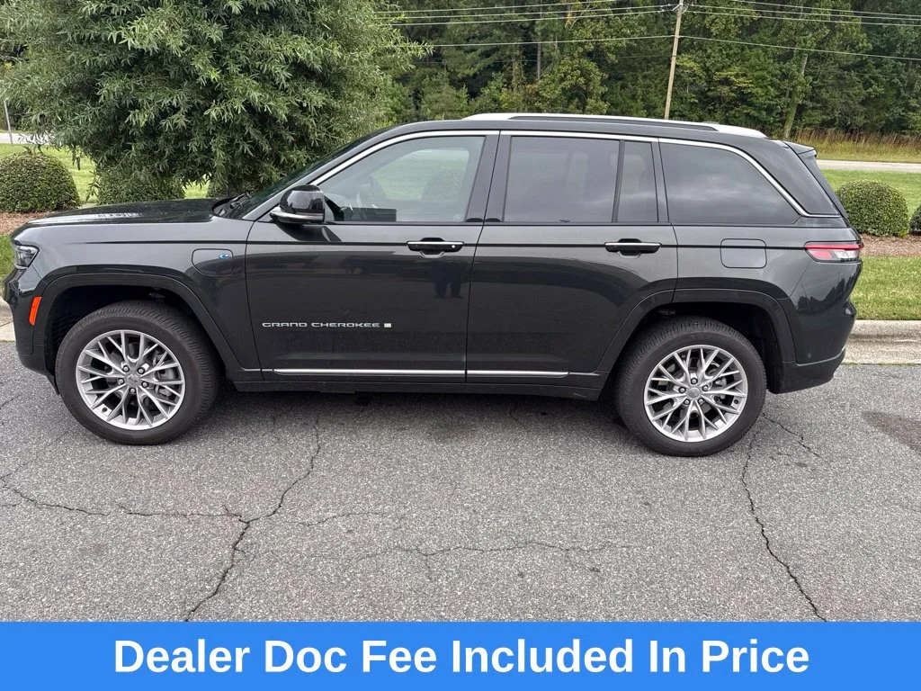 Used 2023 Brown Jeep Summit 4xe image 1