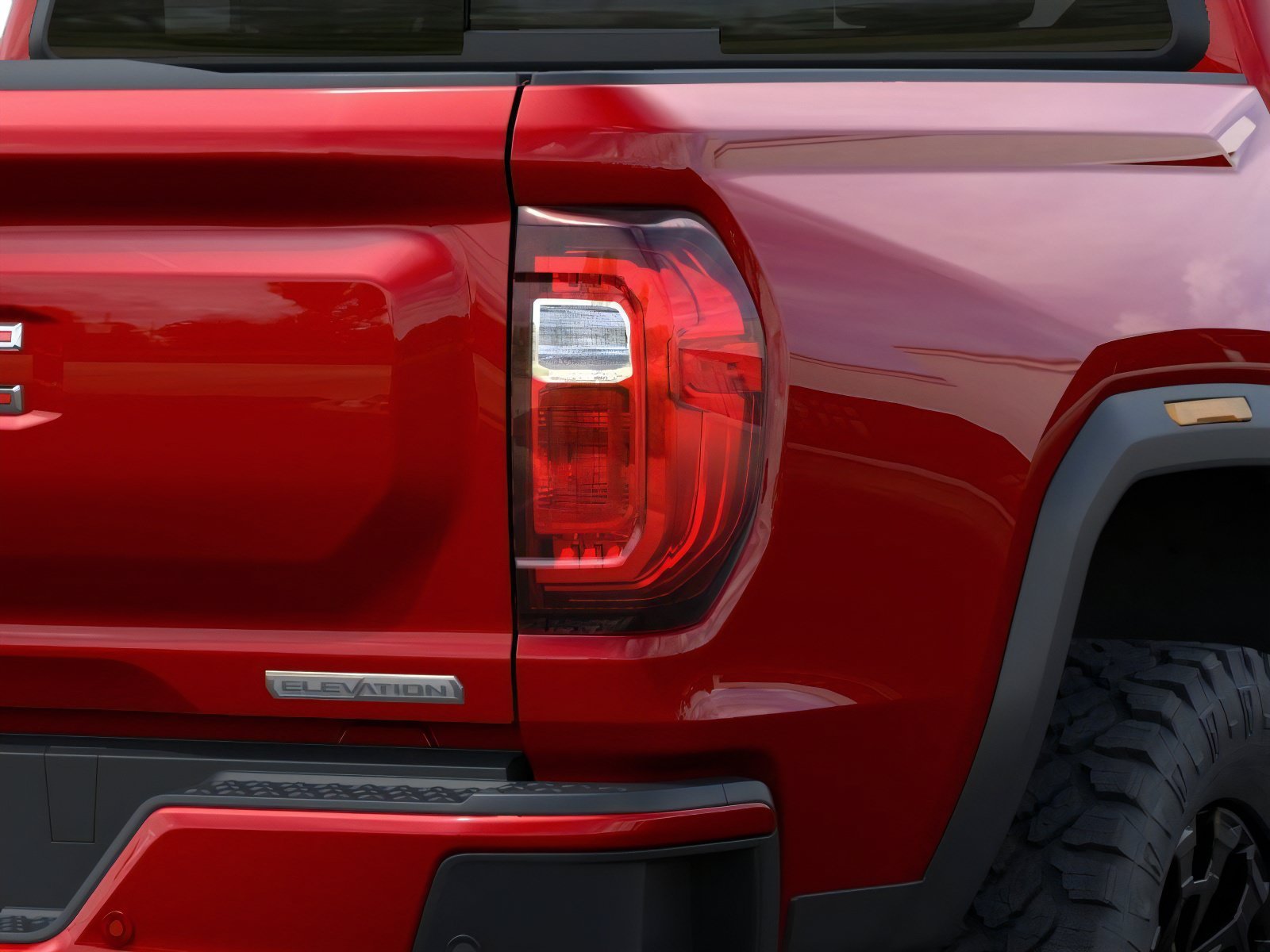 New 2026 Volcanic Red Tintcoat GMC 2WD Elevation image 11
