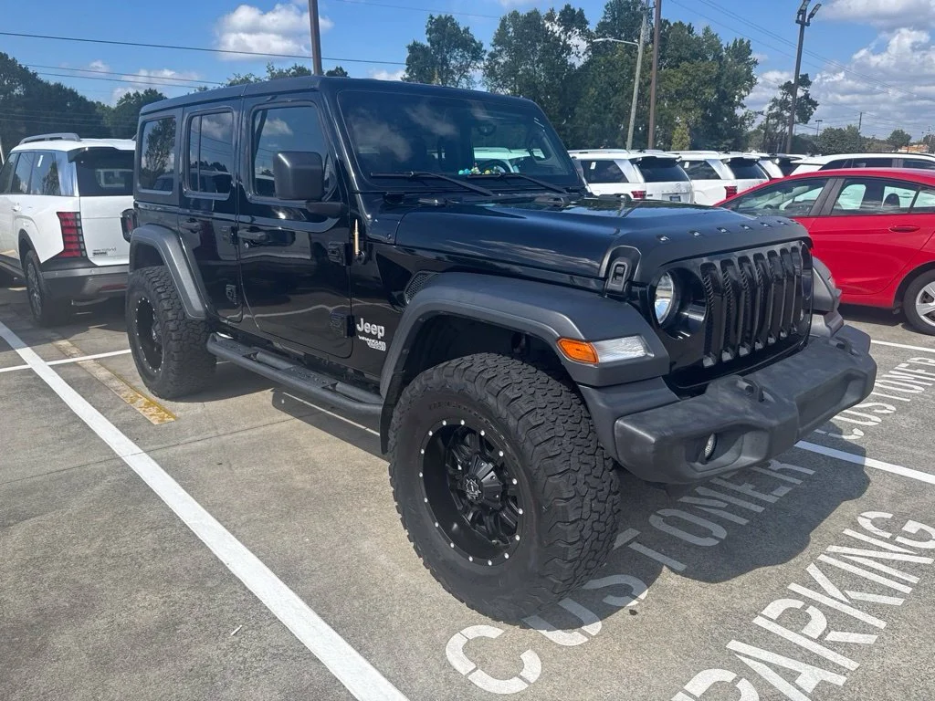Used 2019 Black Jeep Unlimited Sport S image 1