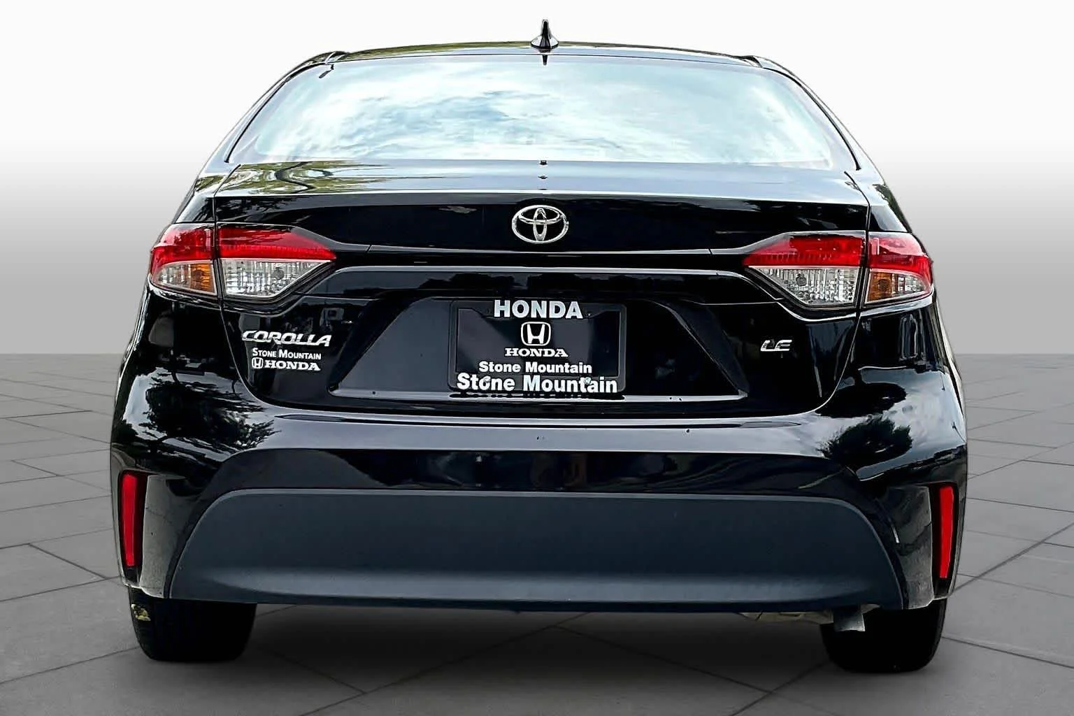 Used 2024 Midnight Black Metallic Toyota LE image 5
