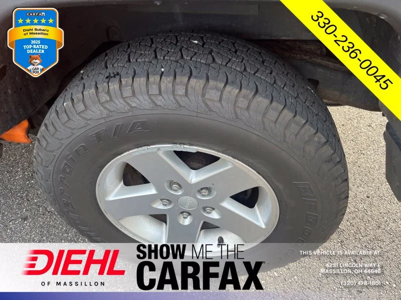Used 2013 Orange Jeep Unlimited Sport image 9