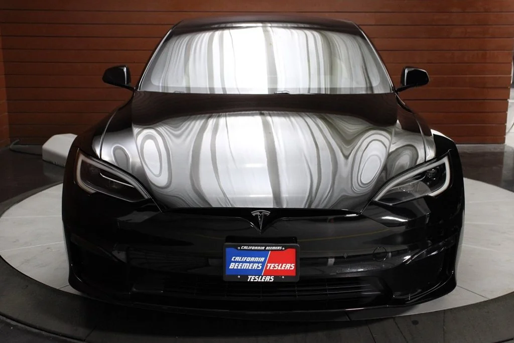 Used 2022 Solid Black Tesla Base image 2