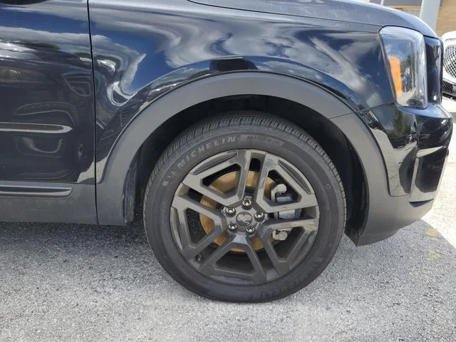 Used 2025 Black Kia EX X-Line image 9