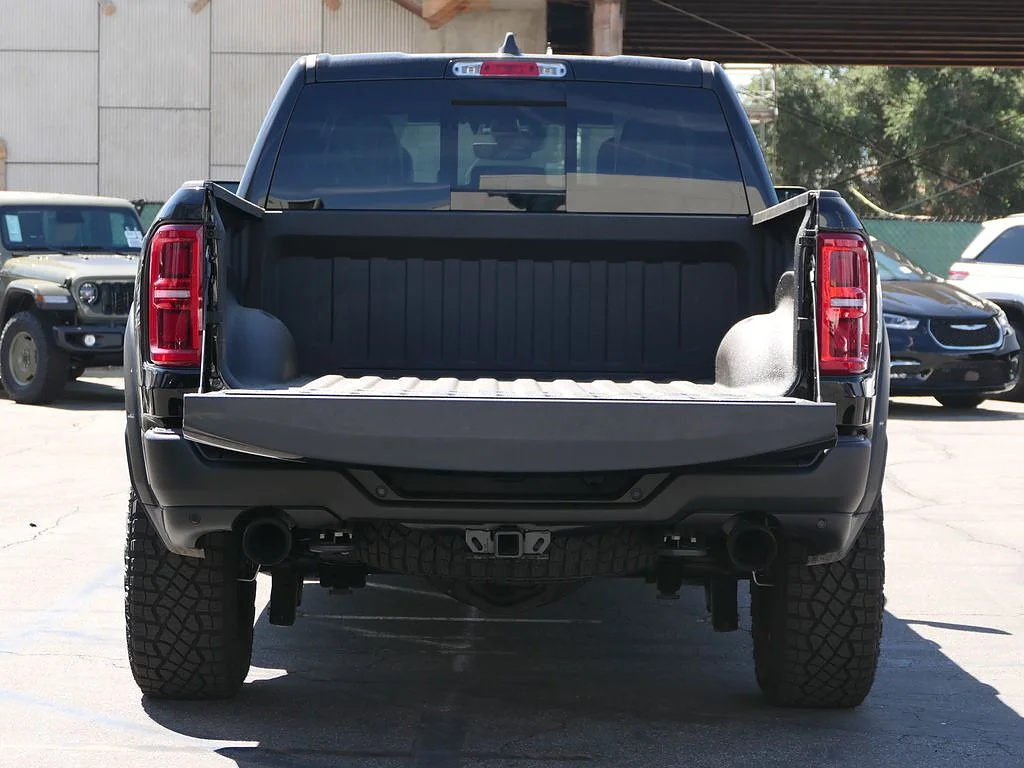 New 2026 Diamond Black Crystal Pearl Coat RAM RHO Crew Cab 4x4 5