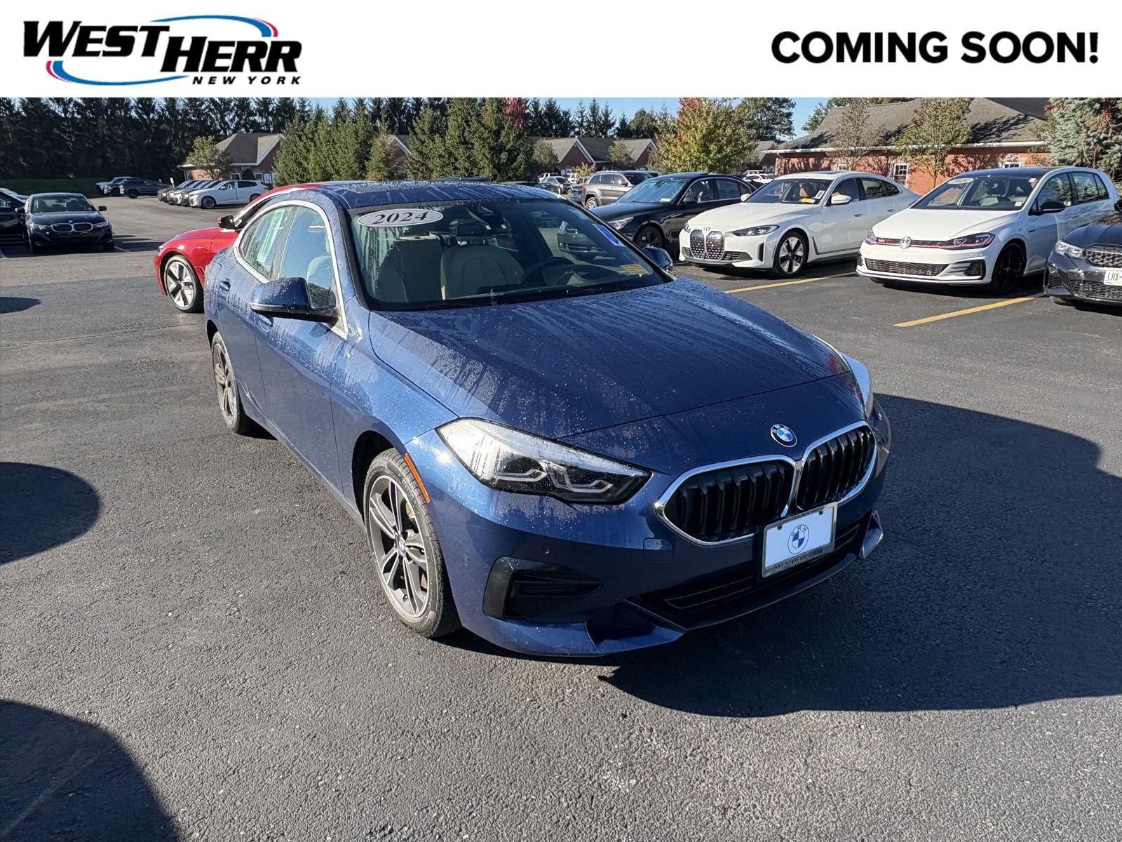 Used 2024 Phytonic Blue Metallic BMW 228i xDrive image 1