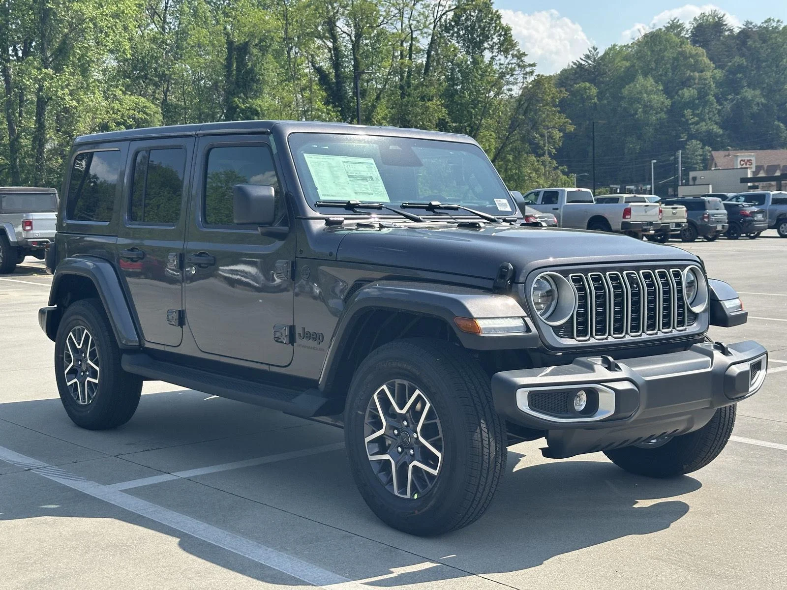 New 2026 Granite Crystal Metallic Clear-Coat Exterior Paint Jeep Sahara image 1