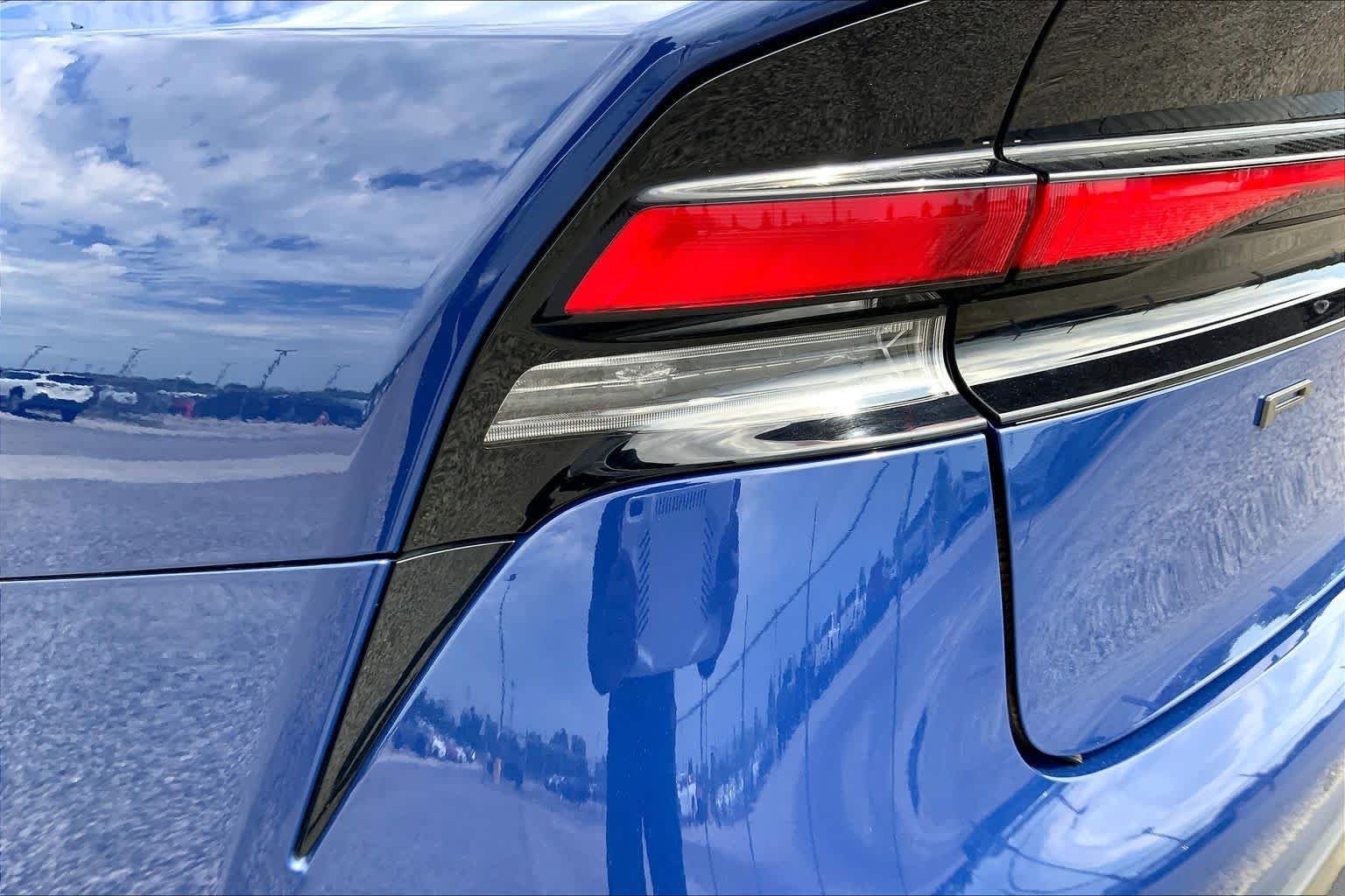 Used 2025 Reservoir Blue Toyota LE image 28