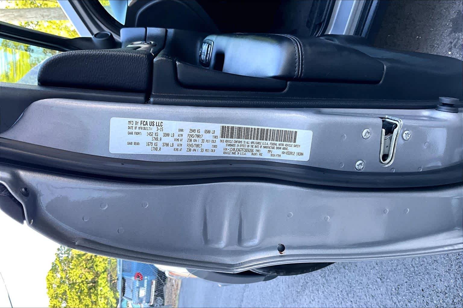 Used 2015 Billet Silver Metallic Clearcoat Jeep Laredo image 32