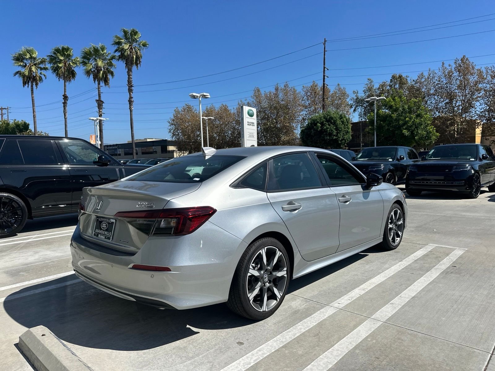Used 2025 Solar Silver Metallic Honda Sport image 3