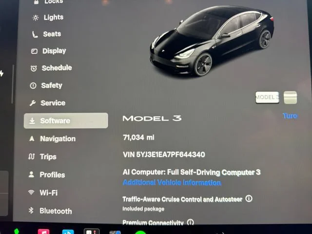 Used 2023 Solid Black Tesla Base image 21