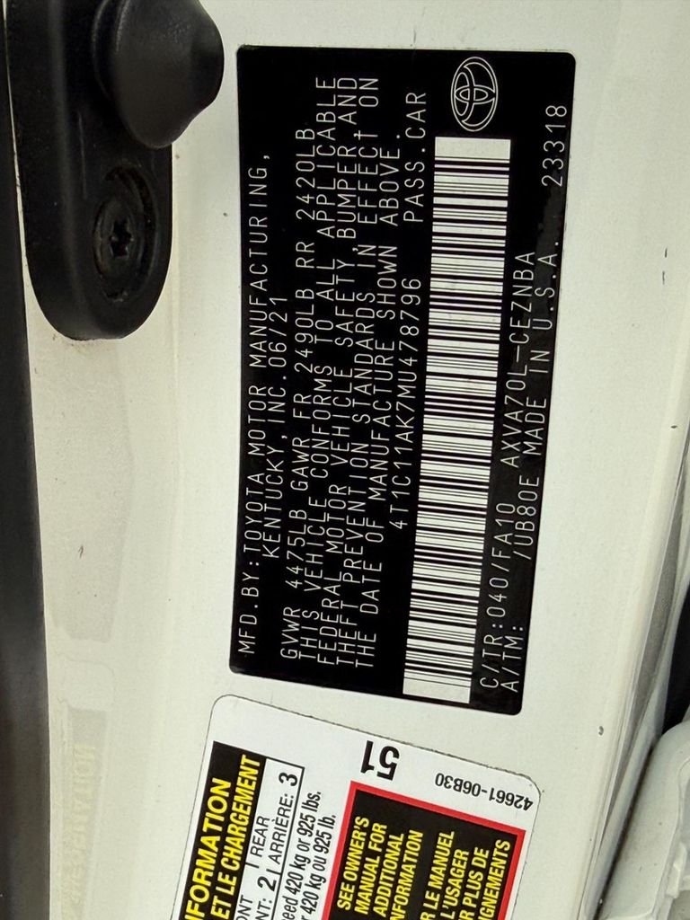 Used 2021 Super White Toyota LE image 31