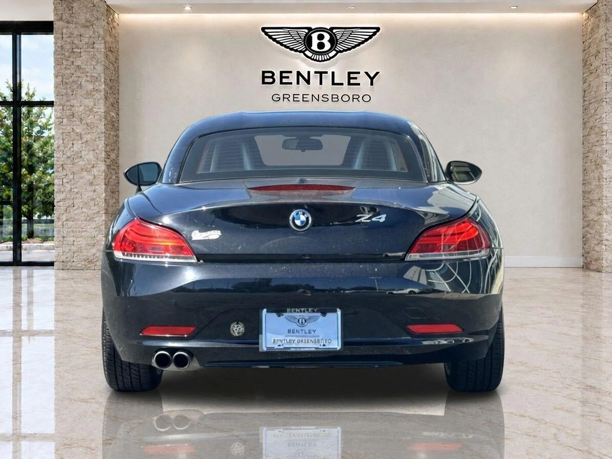 Used 2011 Black Sapphire Metallic BMW sDrive30i image 4