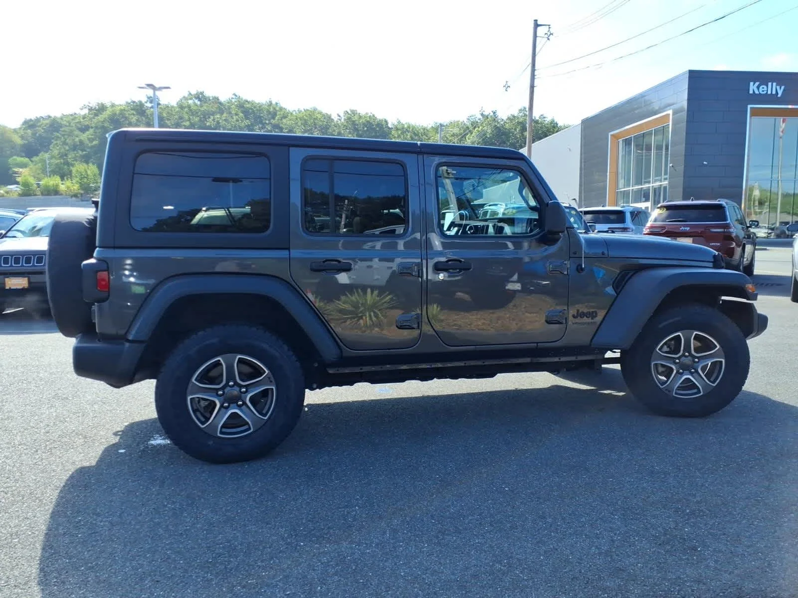 Certified Used 2022 Granite Crystal Metallic Clearcoat Jeep Unlimited Sport S image 6