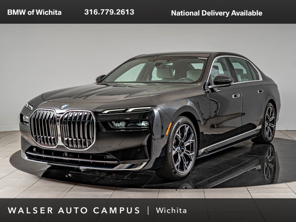 Used 2024 Black Sapphire Metallic BMW eDrive50 image 1