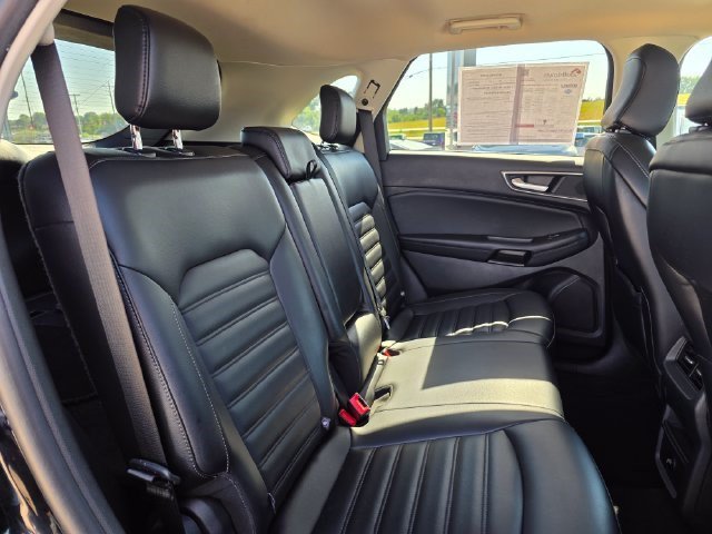 Used 2024 Agate Black Metallic Ford SEL image 12