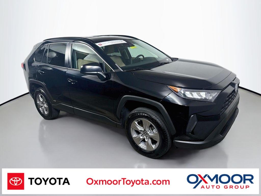 Used 2022 Midnight Black Metallic Toyota Hybrid LE image 1