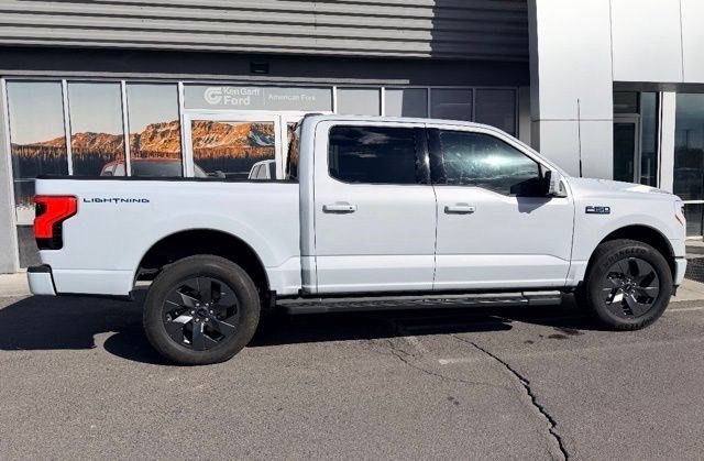 Used 2025 Ford F-150 Lightning Lariat with VIN 1FT6W5L73SWG11073 for sale in American Fork, UT