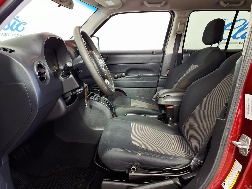 Used 2011 Deep Cherry Red Jeep Sport image 9