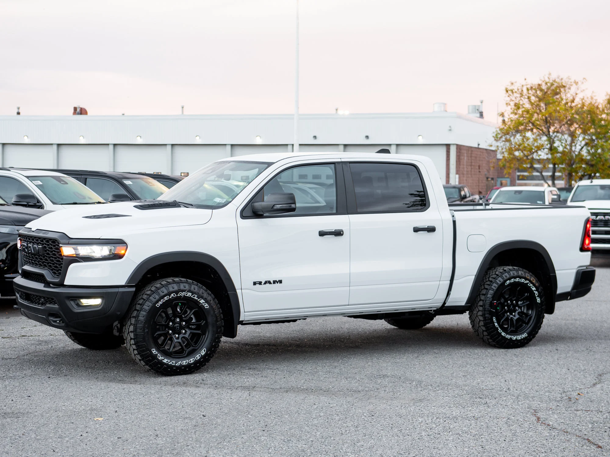New 2026 White RAM Rebel* Crew Cab 4x4, Heated Seats/Wheel, 33 Inch A/T Tires, Rear Locking Diff image 3