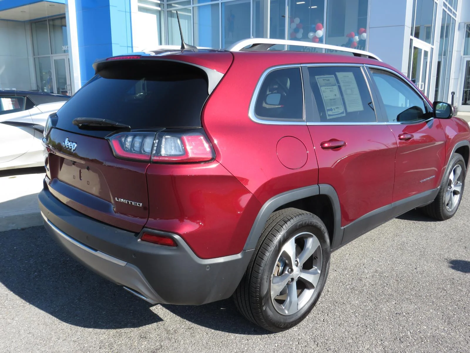 Used 2021 Velvet Red Pearlcoat Jeep Limited image 6