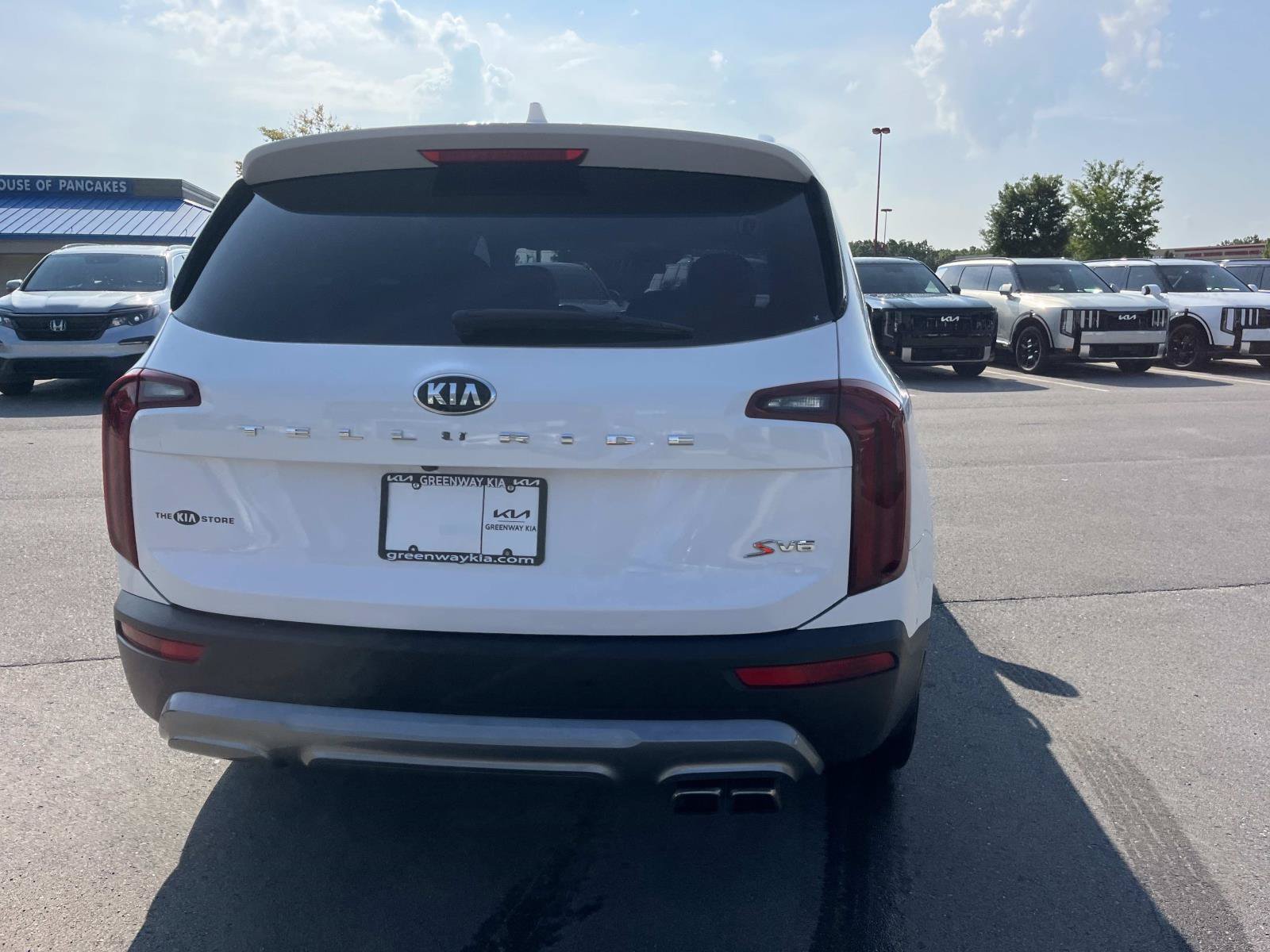 Used 2021 Glacial White Pearl Kia S image 4