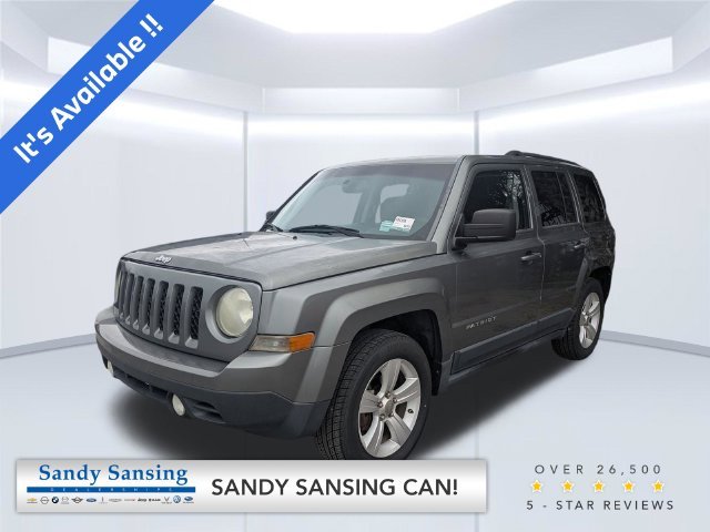 Used 2012 Gray Jeep Sport image 1